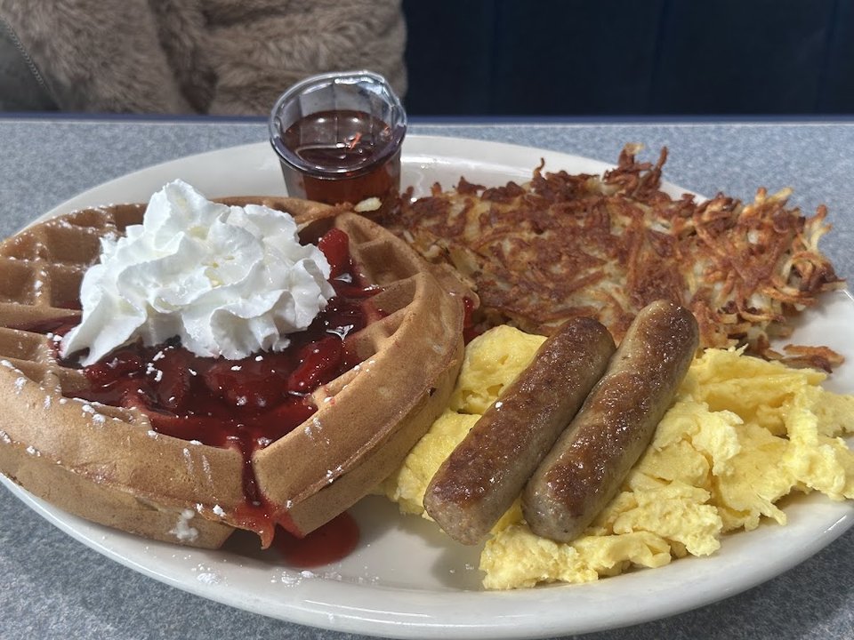 Printed menu with breakfast and brunch sections.