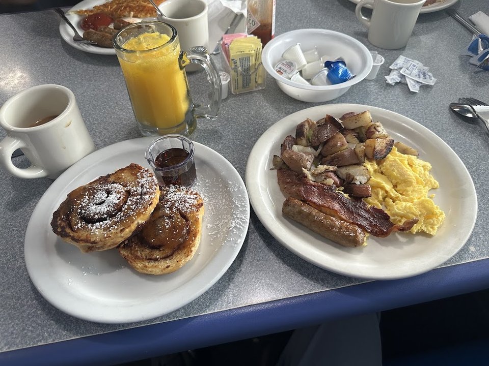 Menu page featuring pancakes and beverages.