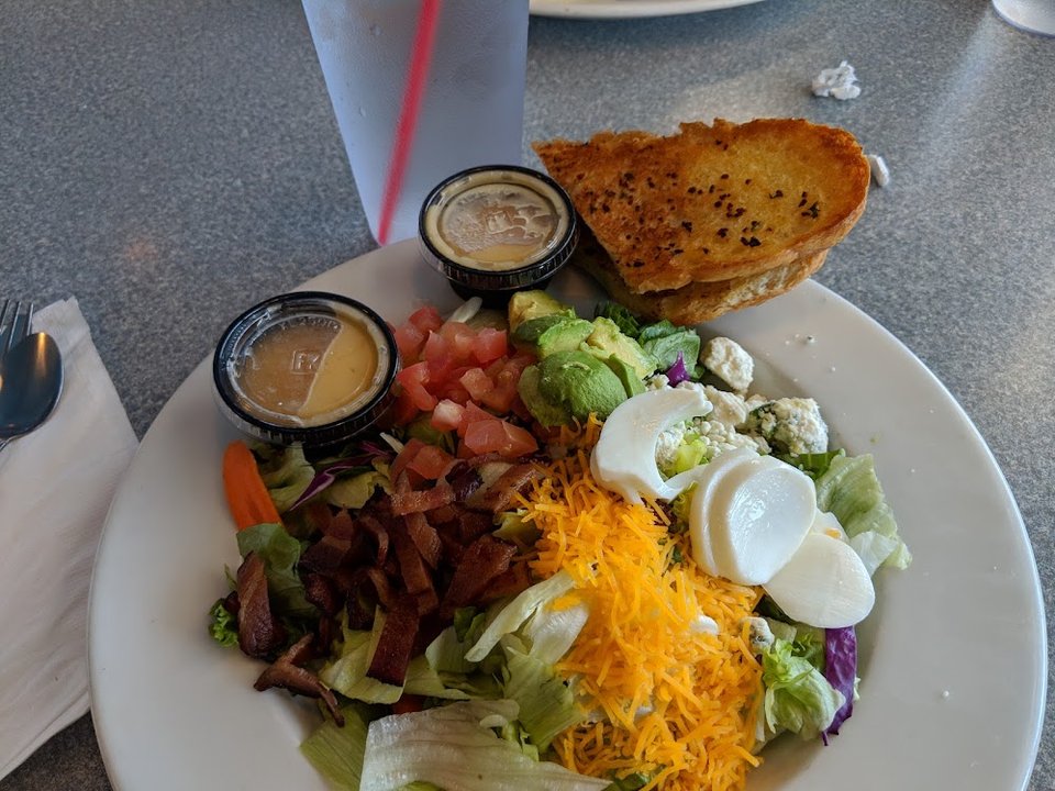 Printed menu with breakfast and brunch sections.
