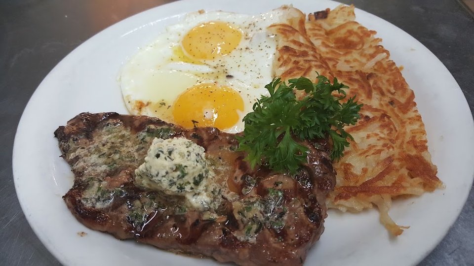 Printed menu with breakfast and brunch sections.