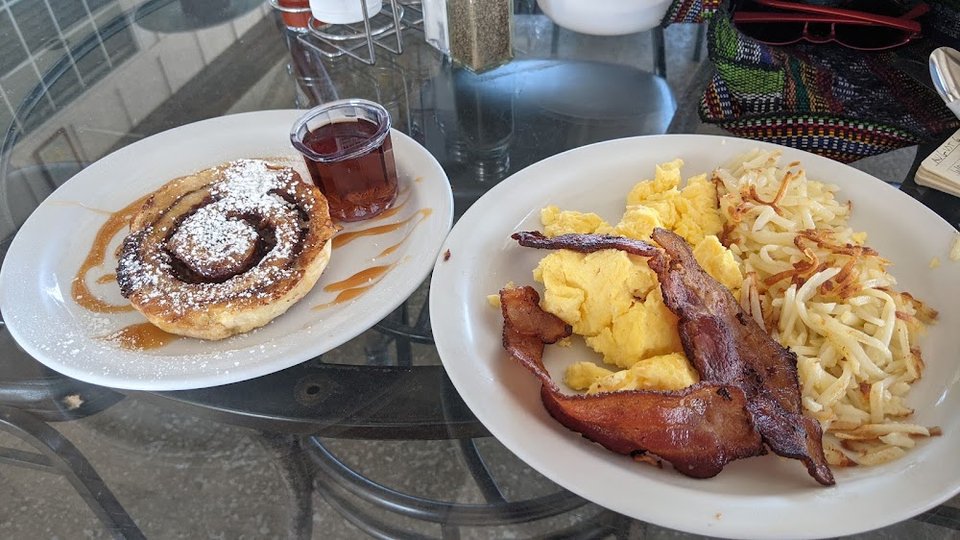 Printed menu with breakfast and brunch sections.